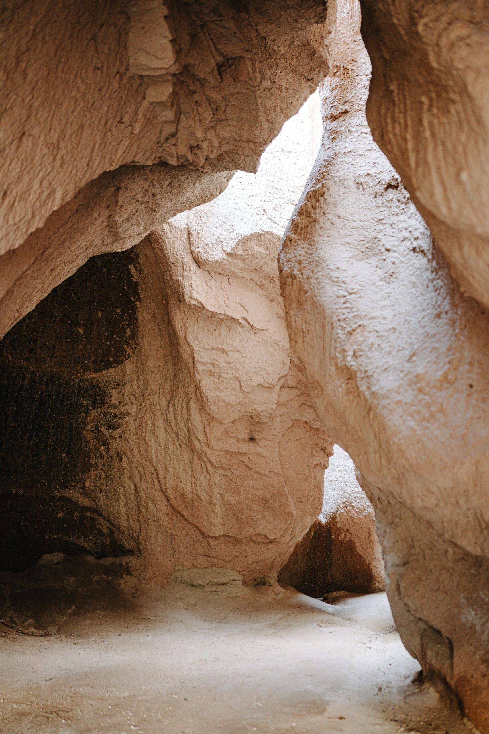 Explore the beauty of naturally eroded rock formations in a serene desert setting.